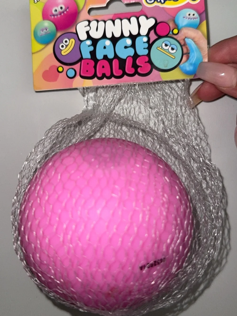 Funny Face Balls Pink Squeeze Toy  by orb